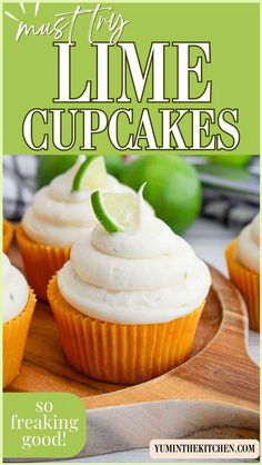 lime cupcakes with white frosting on a cutting board