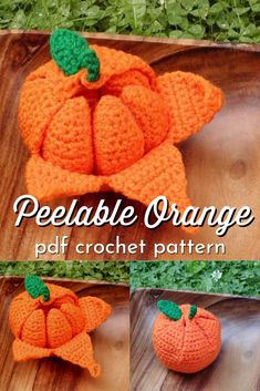 the crocheted pumpkin is sitting on top of a wooden board with green leaves