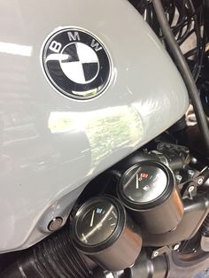 the front end of a motorcycle that is parked