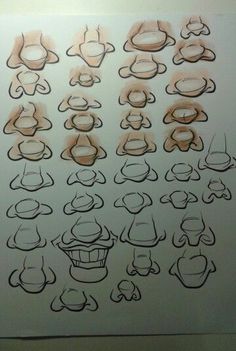 a bunch of drawings that are on a wall