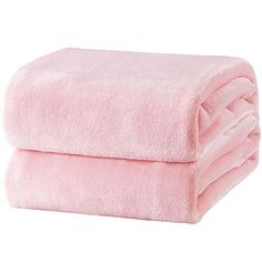 two pink towels folded on top of each other