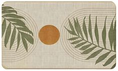 a place mat with palm leaves and an orange circle in the center on a white background