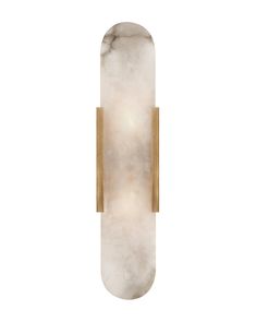 a wall light with a white marble surface and gold trim