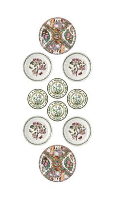 six plates with different designs on them