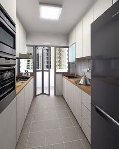 an empty kitchen with white cabinets and stainless steel appliances in front of glass doors that lead to the outside patio