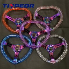 four different colored wheel rims are shown in this image, with the words tixpedor above them