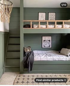 a bunk bed in a room with green painted walls and carpeted flooring next to stairs