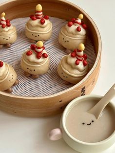 small cupcakes are arranged in the shape of snowmen