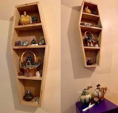 two wooden shelves with vases and other decorative items on them in the corner of a room