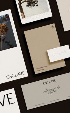 several different types of business cards and envelopes on top of each other with the words enclave written below them