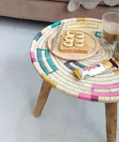 a table with some food on it and a glass of coffee in front of it