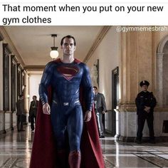 a man dressed as superman standing in a hallway with other people behind him and the caption reads, that moment when you put on your new gym clothes