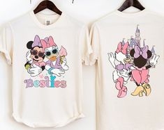 Peckshirt  Minnie Mouse And Daisy Duck Comfort colors Shirt, Disney Mickey Mouse Friends Shirt, Disneyland Best Friends Shirts, Disney Girls Trip Shirt - Print In Your Way. This well-made shirt is the epitome of comfort and elegance. Made from high-quality cotton, this adaptable piece may be worn in any setting. Raise the ante on your appearance with ease!. #disney mickey #best friends #duck #minnie mouse #daisy duck #mickey mouse #best friend #Shirt #Peckshirt Matching Sister Disney Outfits, Disney Best Friend Shirts, Daisy Duck Outfit, Daisy Duck Shirt, Minnie Y Daisy, Disney Girls Trip, Minnie Mouse And Daisy Duck, Best Friends Shirts, Cute Shelf