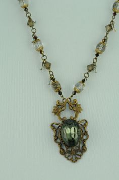 Ornate Vintage Crystal Necklace with Antique by MonforteJewelry, $200.00 Grunge Jewelry Necklaces Crystal, Vintage Necklace Aesthetic, Vintage Necklace Antiques, Grunge Necklace, Grunge Jewelry, Vintage Pendant Necklace, Smokey Topaz, Indie Jewelry, Topaz Pendant