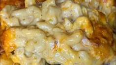 a close up view of some food with cheese on it