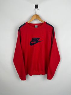 Vintage Nike Red Sweatshirt Size Large Tagged Size: L Measurements: 1.Length- 70CM (27.5'') 2.Chest- 60CM (23.6'') 3.Shoulders- 60CM (23.6'') 4.Sleeves- 55CM (21.6'') Condition: Gently used without any noticeable imperfections; Material: 80% Cotton 20% Polyester A94 Nike Red Crewneck For Sale, Red Sporty Crew Neck T-shirt, University Red Long Sleeve Tops For Winter, Red Sporty Crew T-shirt, Red Sportswear Tops For Streetwear, Red Cotton Sportswear Sweatshirt, Red Sporty Relaxed Fit Tops, Red Sporty Tops With Relaxed Fit, Red Tops For Streetwear Sportswear