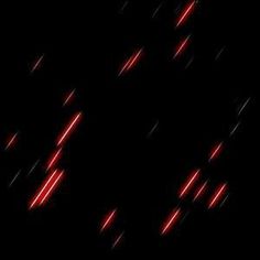 red and white lights shine brightly in the dark night sky, creating an abstract pattern