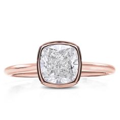 a cushion cut diamond ring in rose gold