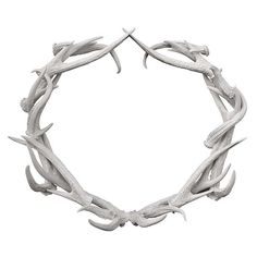 a white circular frame made out of branches