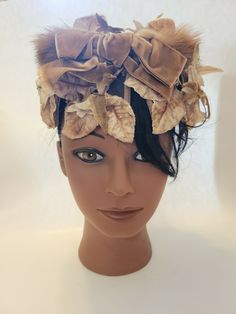 Rare Vintage Mink Lined Hat w/ Leaves by Helen Hat Shop Ventura Helen M. Austin. This hat is so unique and beautiful ! Shades of brown, cream, and taupe leaves on mesh, with a velvet bow. Lined around the top with what I am pretty certain is mink by the look and feel of it. Hat is about 4 inches high, and 7 inches across. This is a hard to find brand, and this piece is in very good shape. Vintage Short Brim Mini Hat For Costume, Adjustable Costume Hats For Vintage Events, Vintage Mini Hat With Short Brim For Costume, Vintage Short Brim Mini Hat For Costumes, Vintage High Crown Hat Bands For Winter, Vintage Curved Brim Headpieces For Kentucky Derby, Vintage Brimmed Headpiece For Kentucky Derby, Vintage Hats For Church And Kentucky Derby, Retro Costume Hats For Vintage Events