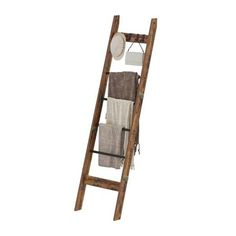 a wooden ladder with towels hanging on it