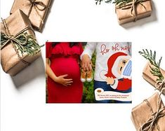 presents wrapped in brown paper and tied with twine on top of each other next to a photo of a pregnant woman