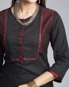 This appealing cotton long kurta in black can be worn anywhere. Itﾒs A-line round neck along with the embroidery is adding the dash of color to the piece. Itﾒs three quarter sleeves are comforting. One can pair this piece with a skirt, pants, palazzo or churidars. Also the look can be enhanced by pairing some fun jewellery from our vide collection.   Cotton Dobby Round Neck with Loop Button 3Q Sleeves A-Line Fit Hand Wash Separately in Cold Water Indian Kurti Designs, Long Kurta, Simple Kurta Designs, Kurti Designs Latest