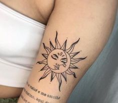 a woman's arm with a sun tattoo on it and a poem written in cursive writing