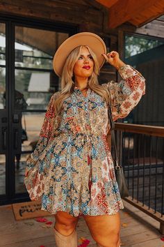 - This flowy dress is as beautiful as a fall sunset! - Airy chiffon material with an abstract print featuring yellows, blues, and coral hues - A v-cut neckline - A button-up bodice - A cinched drawstring waistline with accent tassels - A built-in skirt lining - A flowy yet flattering silhouette that ends in a mini dress length hemline Fall Bridal Shower Outfit For Guest, Cream Colored Boots, Bridal Shower Guest Outfit, Western Dress With Boots, Brunch Dress, Bridal Shower Outfit, Chiffon Material, Flowy Dress, Western Dresses