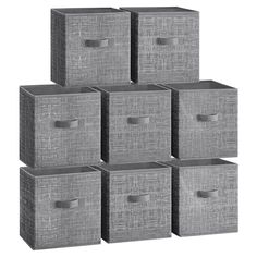 six grey storage boxes with handles on each one side and four smaller bins in the middle