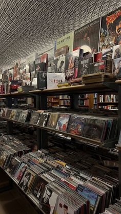 there are many cd's on the shelves in this store that is full of cds