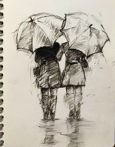 two people with umbrellas standing in the rain