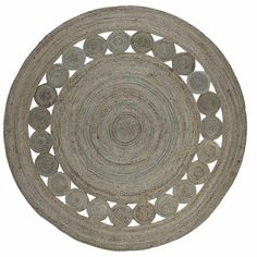 a round rug with circles on the bottom and sides in various sizes, shapes and colors