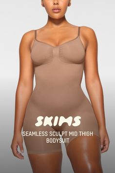 The sculpting bodysuit all over your feed, updated for an even better fit. Wear this mid thigh bodysuit for strong compression and targeted control along the waist, tummy, and legs, plus butt-enhancing pockets for a lifted look. Features front pique stitching along the front and sides for a defined and supported bust, adjustable straps, a wide crotch for added coverage, and an open gusset. Fits true to size. | SKIMS Mid Thigh Bodysuit | Medium Neutral | Seamless Sculpt Sculpting Bodysuit, Shapewear, Adjustable Straps, Lounge Wear, How To Wear