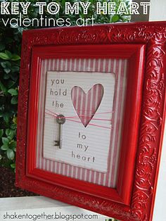 a red frame with a key to my heart and valentine's day card in it