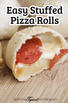 an easy stuffed pizza roll is cut in half