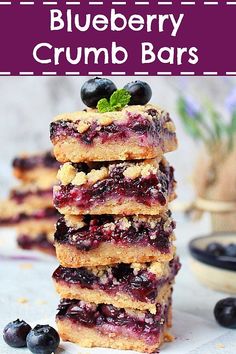 blueberry crumb bars stacked on top of each other