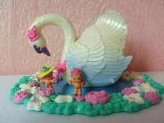 there is a figurine that looks like a swan