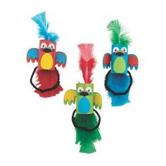 three colorful birds with feathers on their heads are shown in the shape of an eagle