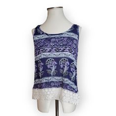 New With Tags Anthropologie Raga Island Printed Sleeveless Top Blue Sz Small Blue, Purple And White Top Lace Trim At The Bottom Measurements Laying Flat Pit To Pit: 19" Length: 23.5" Casual Purple Tank Top For Vacation, Purple Summer Tank Top, Purple Tank Top For Spring And Summer, Spring Purple Cotton Tank Top, Purple Cotton Tank Top For Spring, Purple Floral Print Summer Tank Top, Summer Purple Floral Print Tank Top, Purple Tank Top For Vacation, Summer Purple Cotton Tank Top