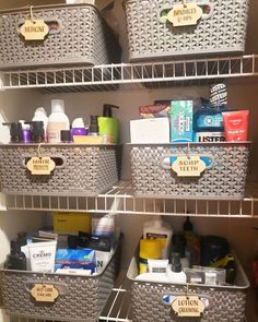 the shelves are organized with baskets and personal care products