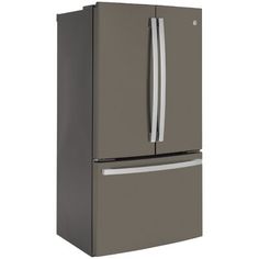 a gray refrigerator freezer sitting next to a white wall