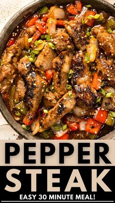 a pan filled with meat and vegetables on top of a table