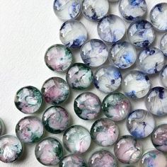 several marbles with different colors and designs on them