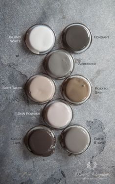 the different shades of paint are shown in this image, including white and grays