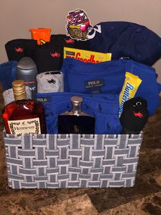 a basket filled with liquor bottles and other items