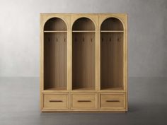 an empty wooden cabinet with drawers and shelves