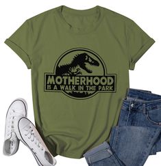 PRICES MAY VARY. MATERIAL: This mama funny shirt is made of 60% Polyester 35% Cotton 5% Spandex, soft and comfortable. Recommend wash in cold water in order to protect the color and pattern. SUITABLE ACCASIONS: Mamasaurus dinosaur t-shirt,dinosaur mom shirt,short sleeve, o neck, light weight and comfy to wear in summer, fall, spring, winter women short sleeve tops. Super soft and comfortable to wear. EASILY PAIR WITH: This cute dinosaur mom shirt is ideal to pair with jeans, shorts or trousers. Funny Pregnancy Shirts, Mom Graphic Tees, Hawaiian Shirt Women, Dinosaur Shirt, Mama Tee, Walk In The Park, Tshirt Funny, Cute Dinosaur, Pregnancy Shirts