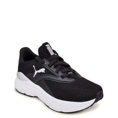 Boost your style and performance with these women's Puma Softride Mayve black/white athletic shoes. Boasting of knit upper, these sneakers have lace-up closure for an adjustable fit, Puma logo patch on the side for iconic look and comfortable padded tongue and collar. Softride comfort foam at the midsole ensures ultimate cushioning support all day long. Tread patterned outsole offers enhanced traction. | Puma Women's Softride Mayve Running Shoe in Black/White Size 6 Medium Puma Sports Shoes, Sports Shoes For Girls, White Athletic Shoes, Puma Running Shoes, Back To School Shoes, Puma Logo, Sport Shoes Women, Puma Women, Puma Shoes