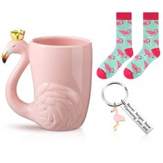 a pink flamingo coffee mug, keychain, and two pairs of socks